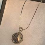 Beautiful Silver Bell Necklace Photo 0