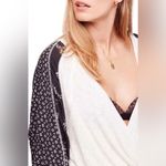 Free People  Auxton Thermal Wrap Top with a floral print Photo 9