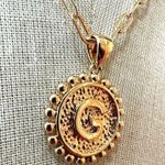 Gold tone G monogram pendant necklace Photo 2