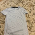 Nike women’s Light Gray top Photo 0