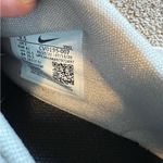 Nike Light Purple Sneakers with Gold Accents and Modern Athletic Design Photo 5