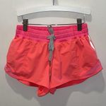 Lululemon Womens Drawstring Flat Front Running Athletic Shorts Coral Pink Size 6 Photo 1