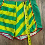 Nike  Dri-Fit Athletic Shorts Women's size Small in Green Yellow stripes running Photo 9