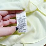 Aritzia • Babaton Amira Dress mini wrap Chamomile lemon yellow rayon Photo 8
