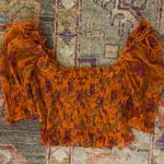 For Love & Lemons Peony Smocked Crop Top in Tangerine Orange Photo 3