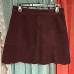 American Eagle mini skirt- wine in color. Suede feel. Size 4. Like new! Photo 1