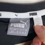 Puma  black modern t-shirt with framed gold spell out logo size S Photo 7
