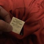 Sexy lady in red 90s plunging top Photo 2