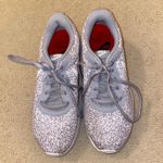 Nike grey and white  running shoes Photo 0