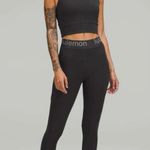 Lululemon  Logo Waistband High Rise Training Crop Graphite Grey Size 2  Pockets Photo 2