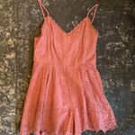 Vestique Romper Photo 0