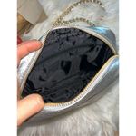 Victoria's Secret Victoria secret silver crossbody purse w gold chain and tassel Photo 6