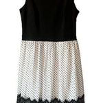 Enfocus Studio   Black and white dress with polka dots and lace detail at hem Photo 0