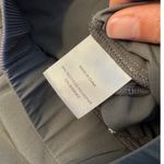 Quince  Women's Performance Tech Ankle Pant in Dark Olive Size XS Photo 3