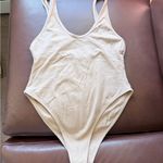 Tiger Mist  Light tan woman’s bodysuit size small Photo 3