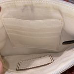 Relic  Brand Collection white crossbody with front snap pocket and zipper closure Photo 11