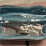 Nicole Miller  cosmetic travel see thru bag with pockets inside great for travel Photo 0