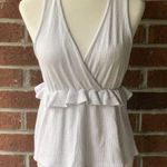 Caution to the Wind Peplum Ruffle Tank Photo 0