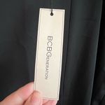 BCBGeneration BCBGGeneration black straight skirt with side split women’s size 12 Photo 5