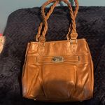 Rosetti  brown leather purse. Comes with mini purse attached to front pocket. Photo 0