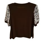 CeCe  Black Top with Floral Sleeves Photo 2