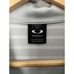 Oakley Women’s Short Sleeve Polo Shirt Grey Stripe M Golf Casual Photo 1