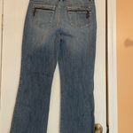 DKNY Y2K Women's Flare Jeans in Blue, size 12. Photo 1