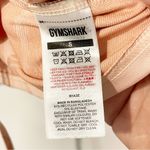 Gymshark  Size Small Pink Hoodie Pink Swirl Cropped Cinch Front Logo Stretch Top Photo 3