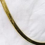 24" Gold Tone Herringbone Necklace Photo 1