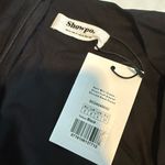 NWT ShowPo NELLI MINI DRESS
Short Puff Sleeve Shirred Back Dress in Black Size 4 Photo 4