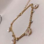 Gold Tone Floral Charm Bracelet Photo 1