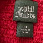 Wild Fable  red smocked spaghetti strap cotton romper with pockets Photo 2