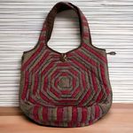 Shoulder silk bag can be closed two way's. Button is made out of coconut shell. Red Photo 0
