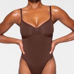 SKIMS NEW! Sculpting Thong Bodysuit Photo 5