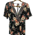 Trixxi Black and Pink Floral patterned short sleeve romper Photo 0