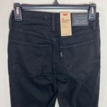 Levi's Levi’s 721 solid black distressed high rise skinny jeans size 27 Photo 3