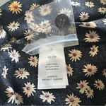 We Wore What Revolve  Black and Ditsy Daisy Romper Size XS Photo 4