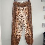 Anthropologie  Brown and Cream Floral Cropped Pants Photo 5