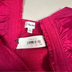 The Drop | Elegant Pink Midi Dress with Ruffle Straps Photo 3