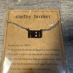 Taylor Swift  Red Necklace Photo 1