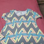LuLaRoe  Gray Tee with Pastel Geometric Pattern Photo 0