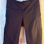 Athleta  Black Biker Shorts with Mesh Inserts - Size ST Tall Photo 0