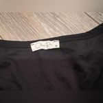 Olivia Rae Black V Neck Baby Short Sleeve Tee Photo 1