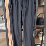 Lululemon  On the Fly 7/8 Pants travel joggers pockets athleisure straight leg Photo 0