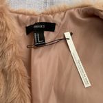 Forever 21  NWT faux fur soft pink vest. Photo 5
