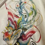 Black Market. Hoodie Jacket - unisex size large - colorful long feathered bird design. This lightweight jacket has been used and shows wear. Some piling, but no rips or stains. Pit to pit 20" Length 25" Photo 8