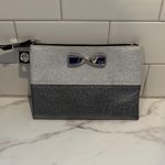 Victoria's Secret Victoria’s Secret silver metallic cosmetic bag with bow accent New Photo 5