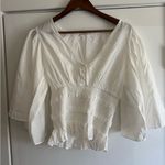Vestique  Cream Blouse with Ruffle Hem Photo 0
