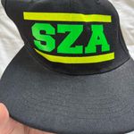Black Cap with Green and Yellow SZA Logo Photo 3