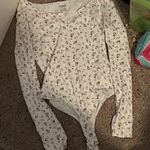 PINK - Victoria's Secret VS PINK Long-Sleeved Rose Bodysuit Photo 0